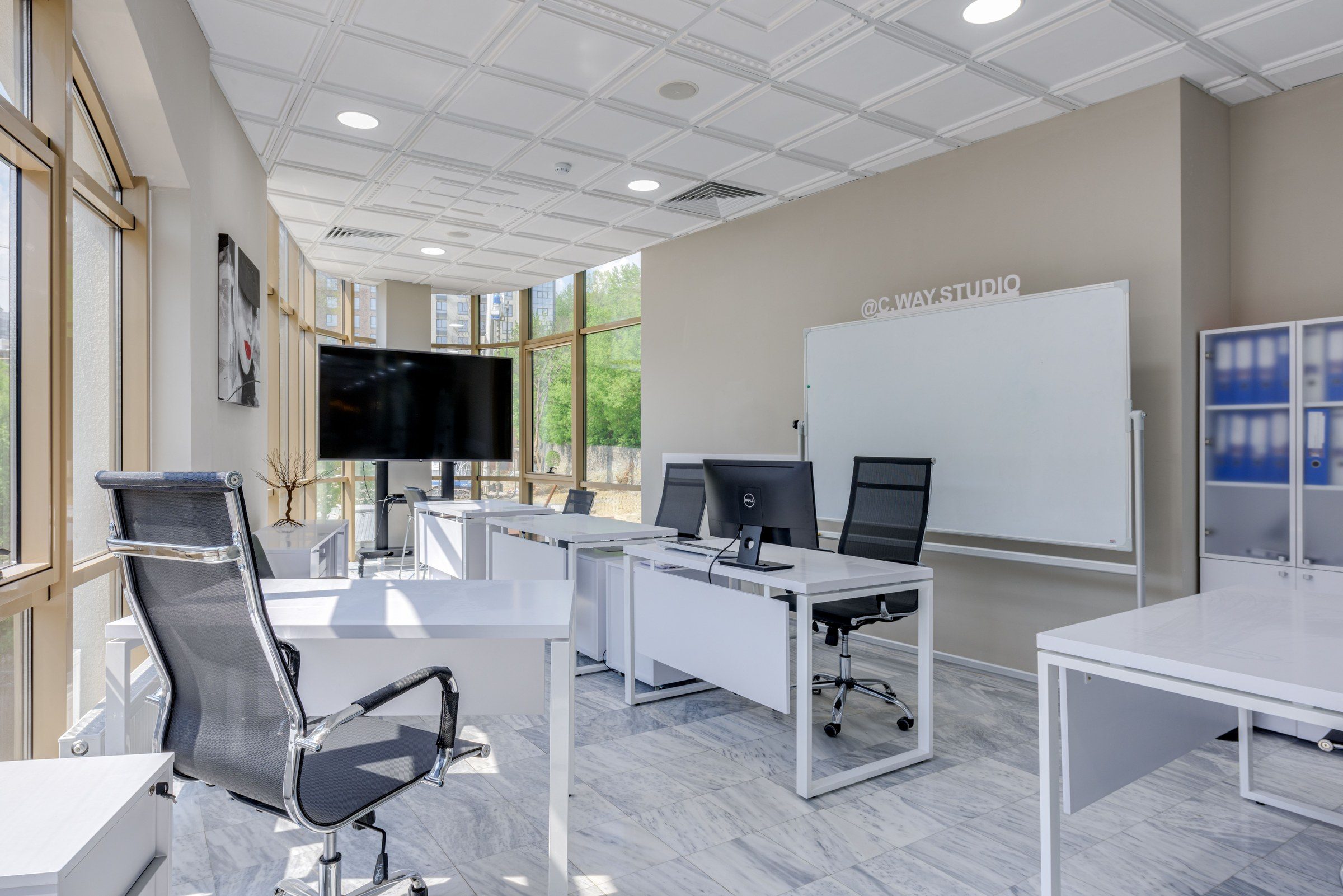 A bright modern office interior, illustrating the work of an advocate in Dubai