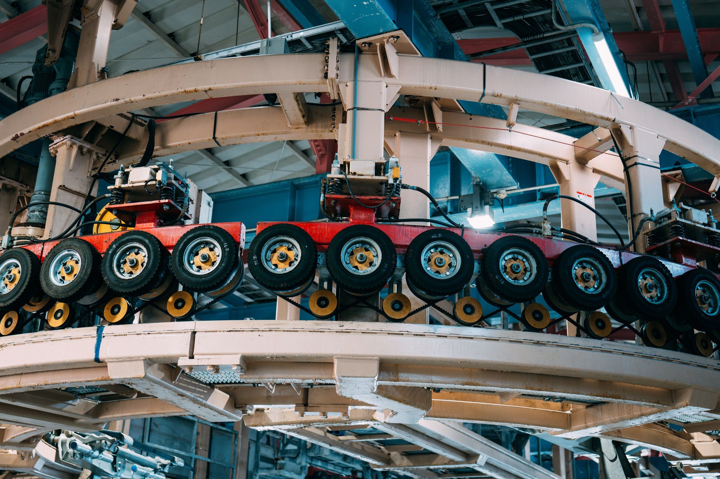 An industrial conveyor line inside a plant, illustrating how gratuity is calculated in the UAE
