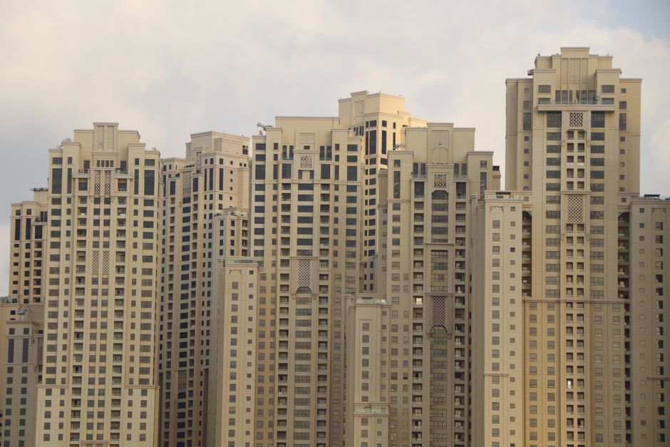 A row of high rise residential towers, illustrating the work of an eviction lawyer in Dubai