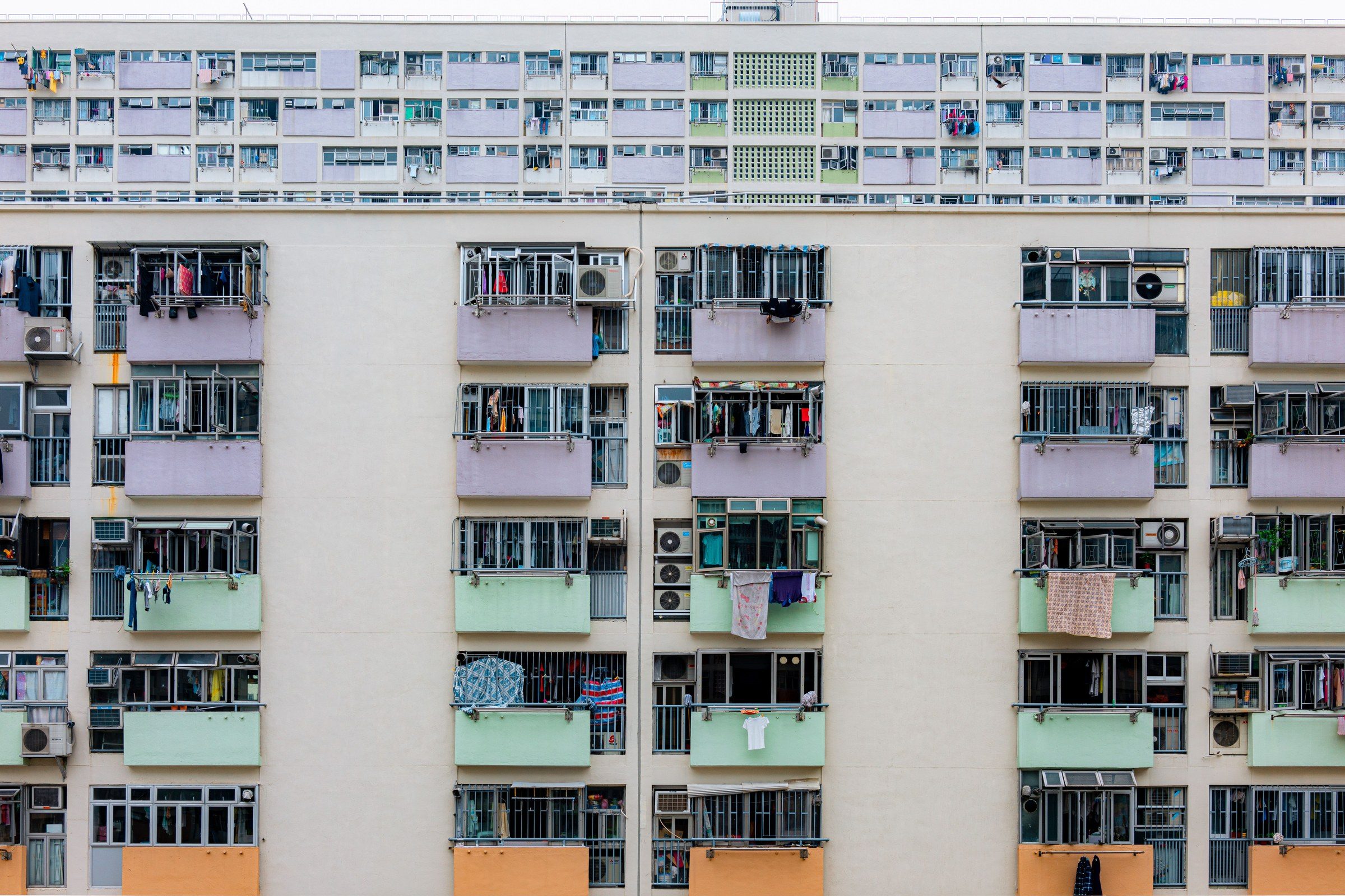 An apartment block of balconies in mixed colours, illustrating the Rental Dispute Centre process in Dubai